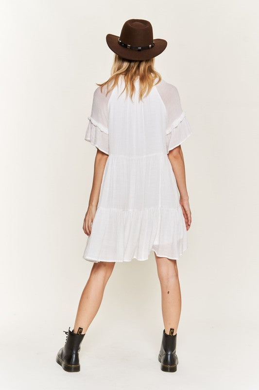 Ruffled neck tiered mini dress